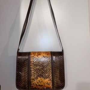 Snake skin cross body bag.